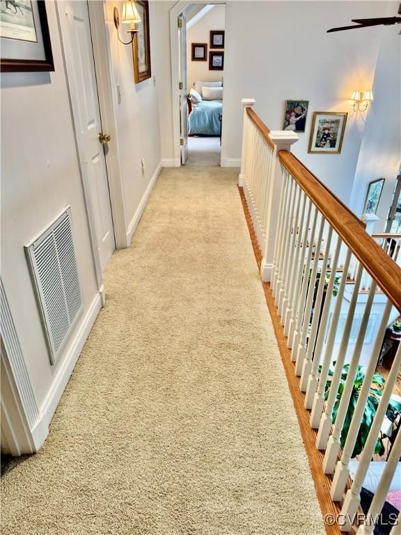 13300 Old Telegraph Rd, Providence Forge, VA 23140 - corridor with light carpet and an upstairs landing