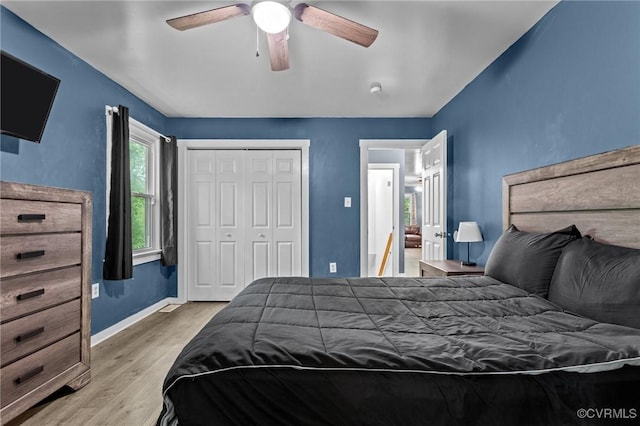2465 W Deerpath Dr, Powhatan, VA 23139 - bedroom with wood finished floors, baseboards, a closet, and ceiling fan