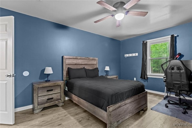 2465 W Deerpath Dr, Powhatan, VA 23139 - bedroom with wood finished floors, baseboards, and ceiling fan