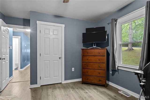 2465 W Deerpath Dr, Powhatan, VA 23139 - bedroom with wood finished floors and baseboards