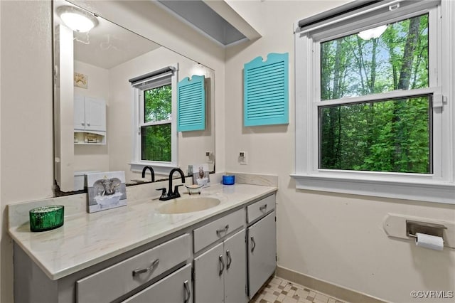 2465 W Deerpath Dr, Powhatan, VA 23139 - bathroom with baseboards and vanity