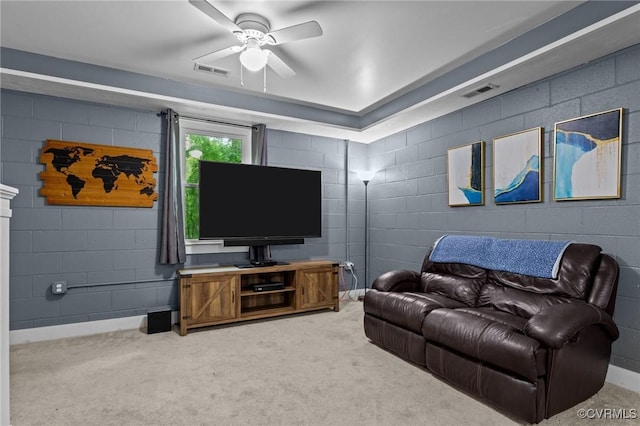 2465 W Deerpath Dr, Powhatan, VA 23139 - living room with a ceiling fan, light colored carpet, and concrete block wall