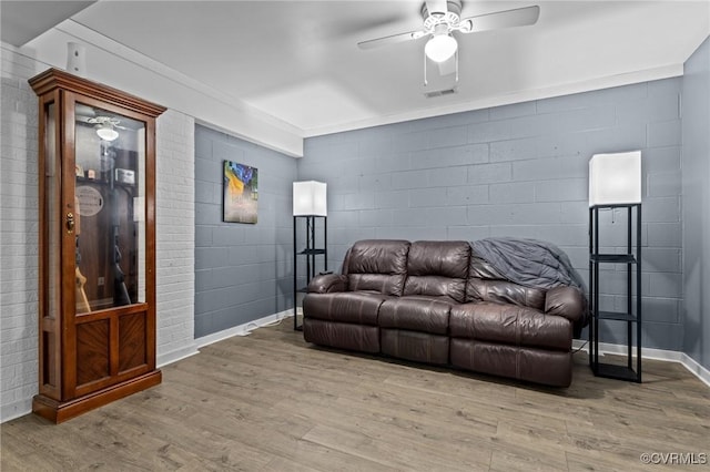 2465 W Deerpath Dr, Powhatan, VA 23139 - living area featuring ceiling fan, wood finished floors, concrete block wall, and baseboards