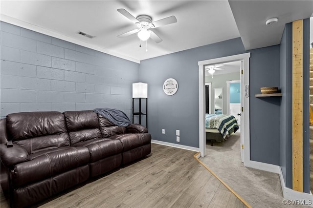 2465 W Deerpath Dr, Powhatan, VA 23139 - living area featuring ceiling fan, light wood-style floors, baseboards, and concrete block wall