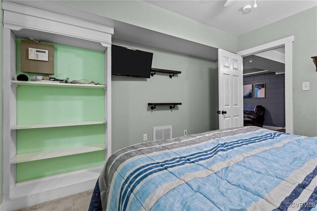2465 W Deerpath Dr, Powhatan, VA 23139 - carpeted bedroom featuring a walk in closet, a closet, and ceiling fan