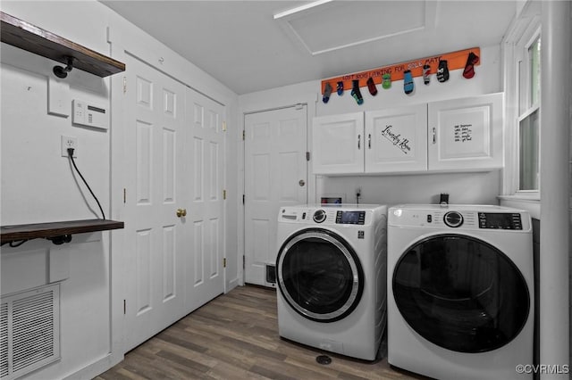 2465 W Deerpath Dr, Powhatan, VA 23139 - laundry room with cabinet space, attic access, washing machine and clothes dryer, and dark wood-style flooring