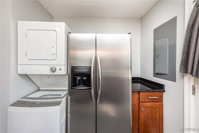 25 Cherry St, Petersburg, VA 23803 - laundry area featuring stacked washer / dryer and electric panel