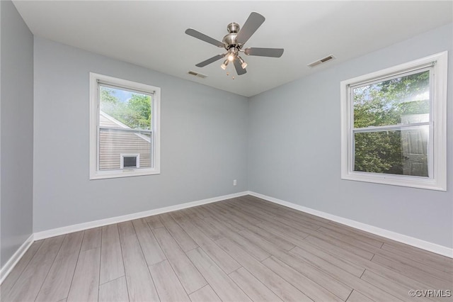 25 Cherry St, Petersburg, VA 23803 - spare room featuring wood finished floors, baseboards, and ceiling fan