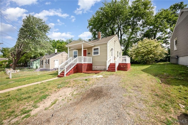25 Cherry St, Petersburg, VA 23803 - view of front of home with a chimney