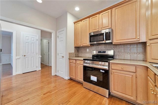 1355 Hawkins Wood Cir, Midlothian, VA 23114 - kitchen featuring stainless steel appliances, light brown cabinets, light countertops, and recessed lighting