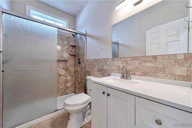 1355 Hawkins Wood Cir, Midlothian, VA 23114 - full bath featuring tile walls, a stall shower, toilet, and vanity