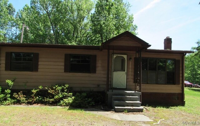 27701 W Prince Edward Hwy, Burkeville, VA 23922 - view of front of house with a chimney and crawl space