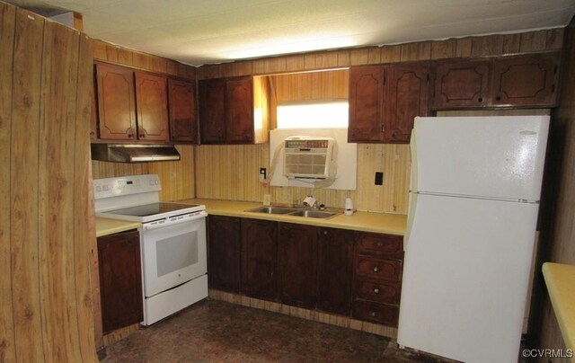 27701 W Prince Edward Hwy, Burkeville, VA 23922 - kitchen featuring white appliances, under cabinet range hood, a sink, an AC wall unit, and light countertops