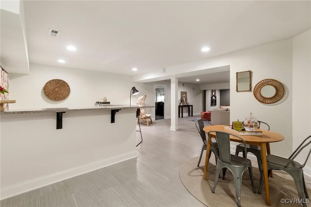 16412 Ravenchase Way, Moseley, VA 23120 - dining space with recessed lighting and light wood-style flooring