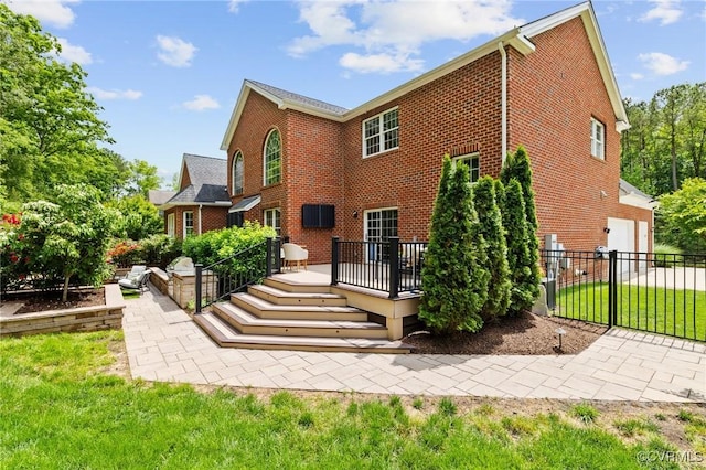 16412 Ravenchase Way, Moseley, VA 23120 - rear view of house with brick siding and a wooden deck