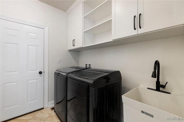 16412 Ravenchase Way, Moseley, VA 23120 - laundry area featuring cabinet space, separate washer and dryer, and light tile patterned flooring
