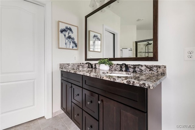 16412 Ravenchase Way, Moseley, VA 23120 - full bathroom with double vanity, tile patterned flooring, and a shower