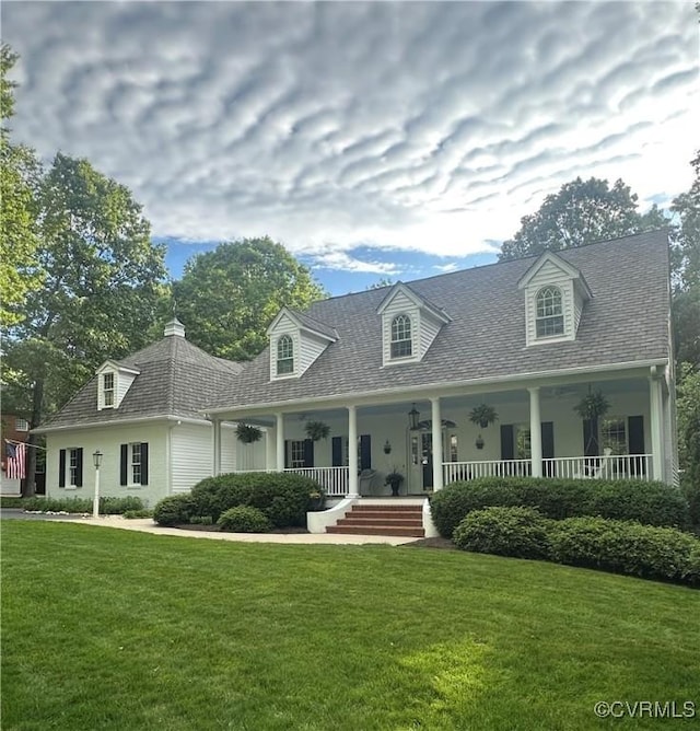 9226 Shelton Pointe Dr, Mechanicsville, VA 23116 - new england style home with a front lawn and a porch