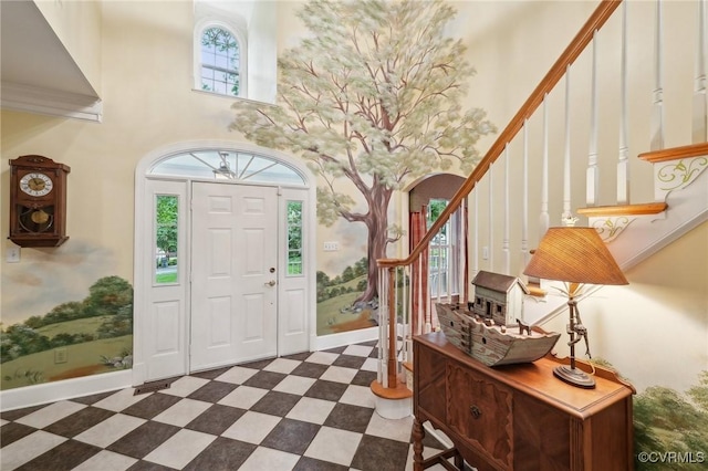 9226 Shelton Pointe Dr, Mechanicsville, VA 23116 - entrance foyer featuring stairs, a high ceiling, tile patterned floors, and arched walkways