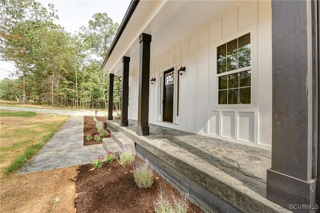 170 Glenmore Ln, Keswick, VA 22947 - view of property exterior with covered porch and board and batten siding