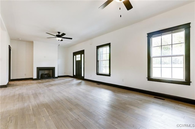 170 Glenmore Ln, Keswick, VA 22947 - unfurnished living room with a ceiling fan, light wood-type flooring, and a fireplace
