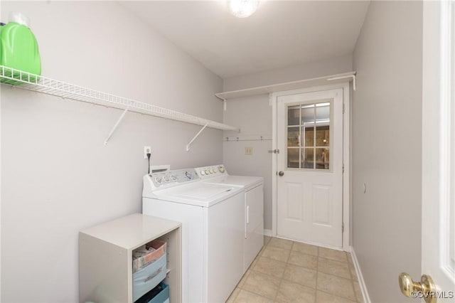 12727 Lodore Rd, Amelia Courthouse, VA 23002 - washroom with washer and clothes dryer and baseboards