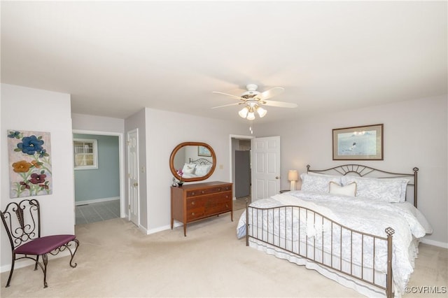 12727 Lodore Rd, Amelia Courthouse, VA 23002 - bedroom with light colored carpet, baseboards, and a ceiling fan