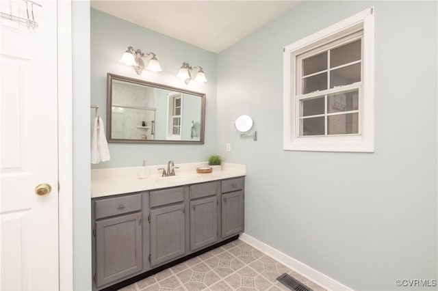 12727 Lodore Rd, Amelia Courthouse, VA 23002 - full bath with vanity, baseboards, and a shower