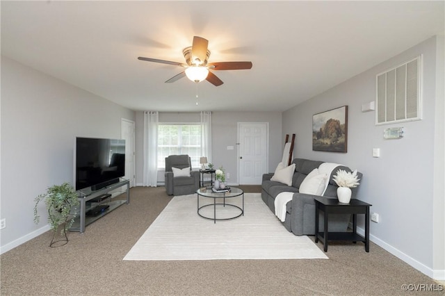 12727 Lodore Rd, Amelia Courthouse, VA 23002 - carpeted living room featuring a ceiling fan and baseboards
