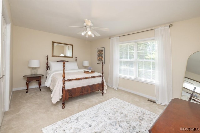 12727 Lodore Rd, Amelia Courthouse, VA 23002 - bedroom featuring light carpet, baseboards, and a ceiling fan