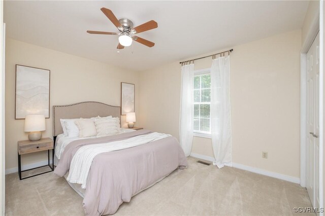 12727 Lodore Rd, Amelia Courthouse, VA 23002 - bedroom featuring light carpet, baseboards, and ceiling fan