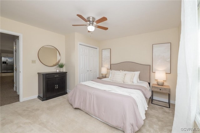 12727 Lodore Rd, Amelia Courthouse, VA 23002 - bedroom with light carpet, stainless steel fridge with ice dispenser, a closet, a ceiling fan, and baseboards