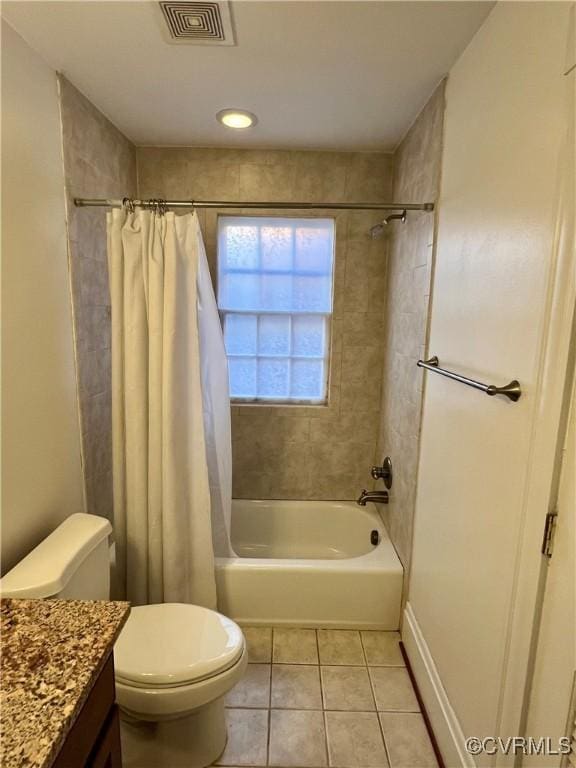 bathroom featuring tile patterned flooring, shower / tub combo with curtain, toilet, and vanity