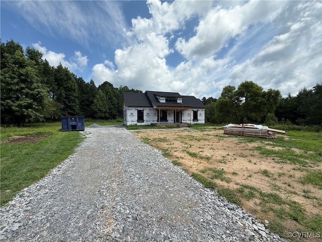 TBD Turkey Egg Rd, Dinwiddie, VA 23841 - view of front of house featuring gravel driveway, a view of trees, and a front lawn