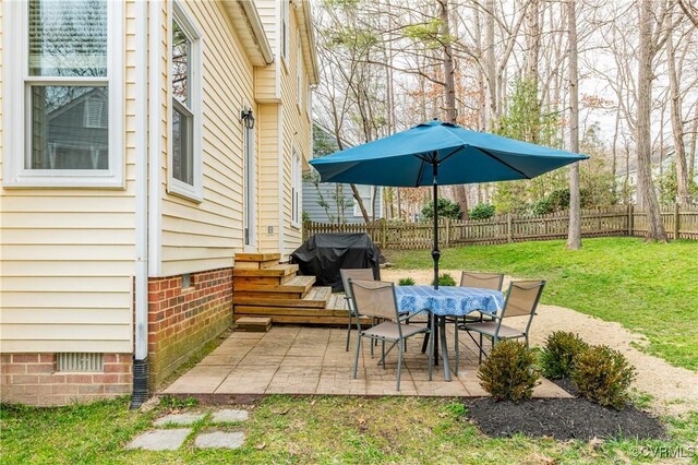 view of patio featuring grilling area and outdoor dining area