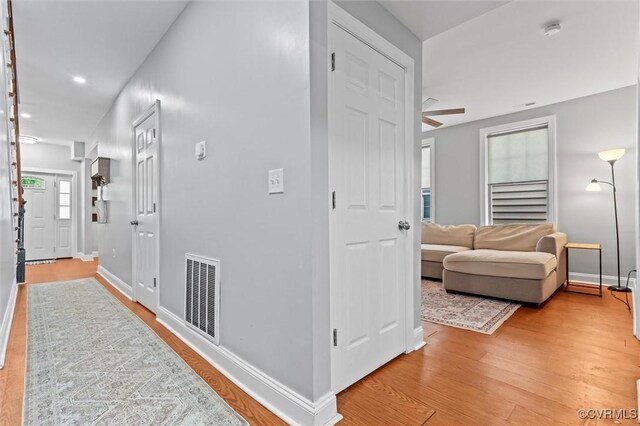 1415 N 25th St, Richmond, VA 23223 - corridor featuring light wood-type flooring, baseboards, and recessed lighting
