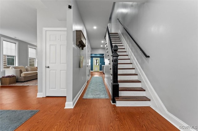 1415 N 25th St, Richmond, VA 23223 - staircase with wood finished floors, baseboards, and recessed lighting