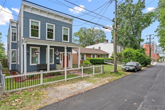 1415 N 25th St, Richmond, VA 23223 - view of front facade with a porch and a fenced front yard