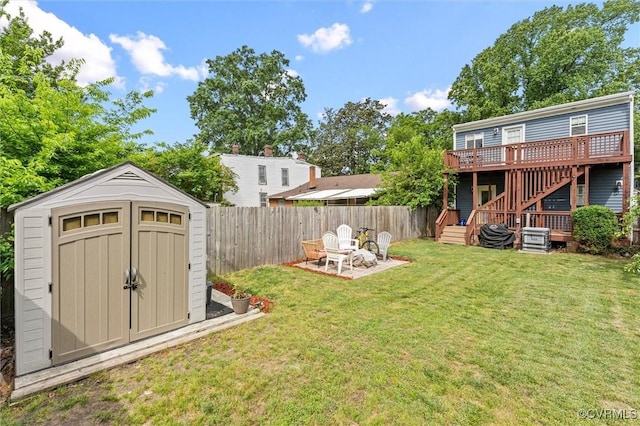1415 N 25th St, Richmond, VA 23223 - view of yard with stairway, a storage shed, a wooden deck, an outbuilding, and a patio