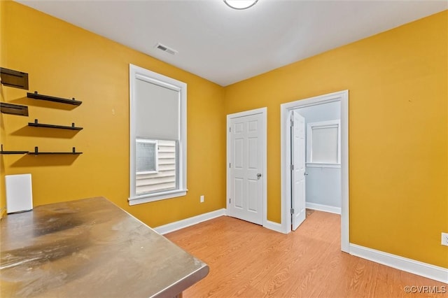 1415 N 25th St, Richmond, VA 23223 - unfurnished office featuring light wood-style flooring and baseboards