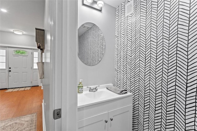 1415 N 25th St, Richmond, VA 23223 - bathroom with wood finished floors and vanity