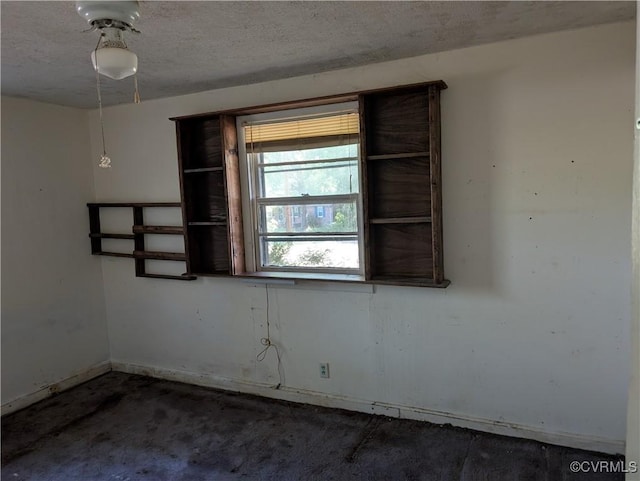 1555 Holly Hills Rd, Powhatan, VA 23139 - spare room with a textured ceiling, baseboards, and unfinished concrete flooring