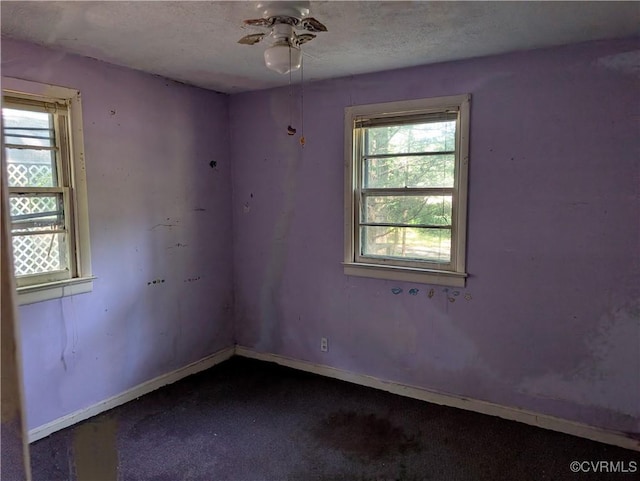 1555 Holly Hills Rd, Powhatan, VA 23139 - carpeted empty room featuring ceiling fan, baseboards, and a textured ceiling