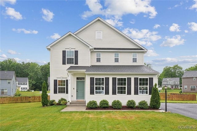 traditional home with roof with shingles