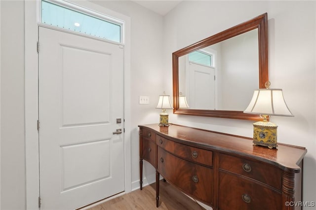 doorway featuring light wood finished floors