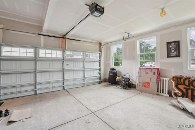 garage featuring a garage door opener
