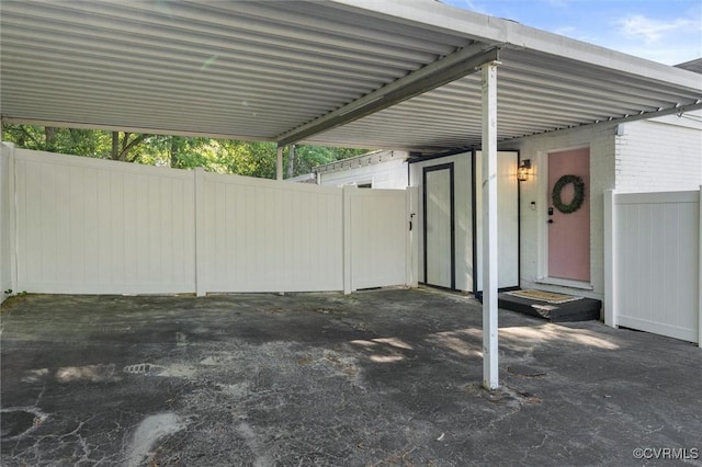 view of patio / terrace featuring fence