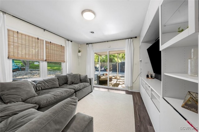 living room with wood finished floors