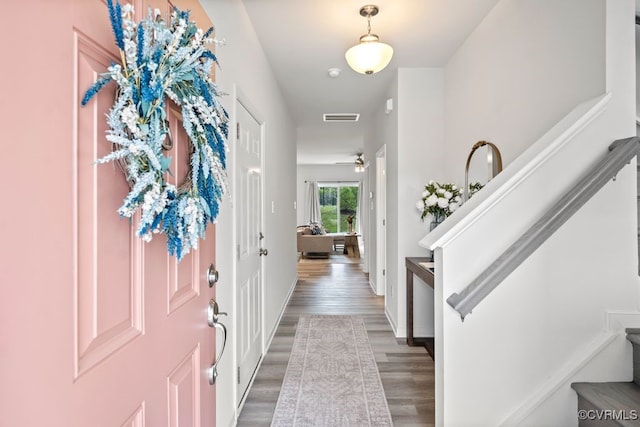 11348 Benton Pointe Way, Chester, VA 23831 - entrance foyer with light wood finished floors, stairway, and baseboards