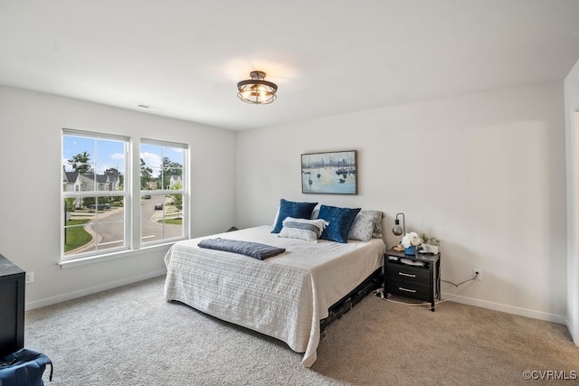 11348 Benton Pointe Way, Chester, VA 23831 - carpeted bedroom featuring baseboards